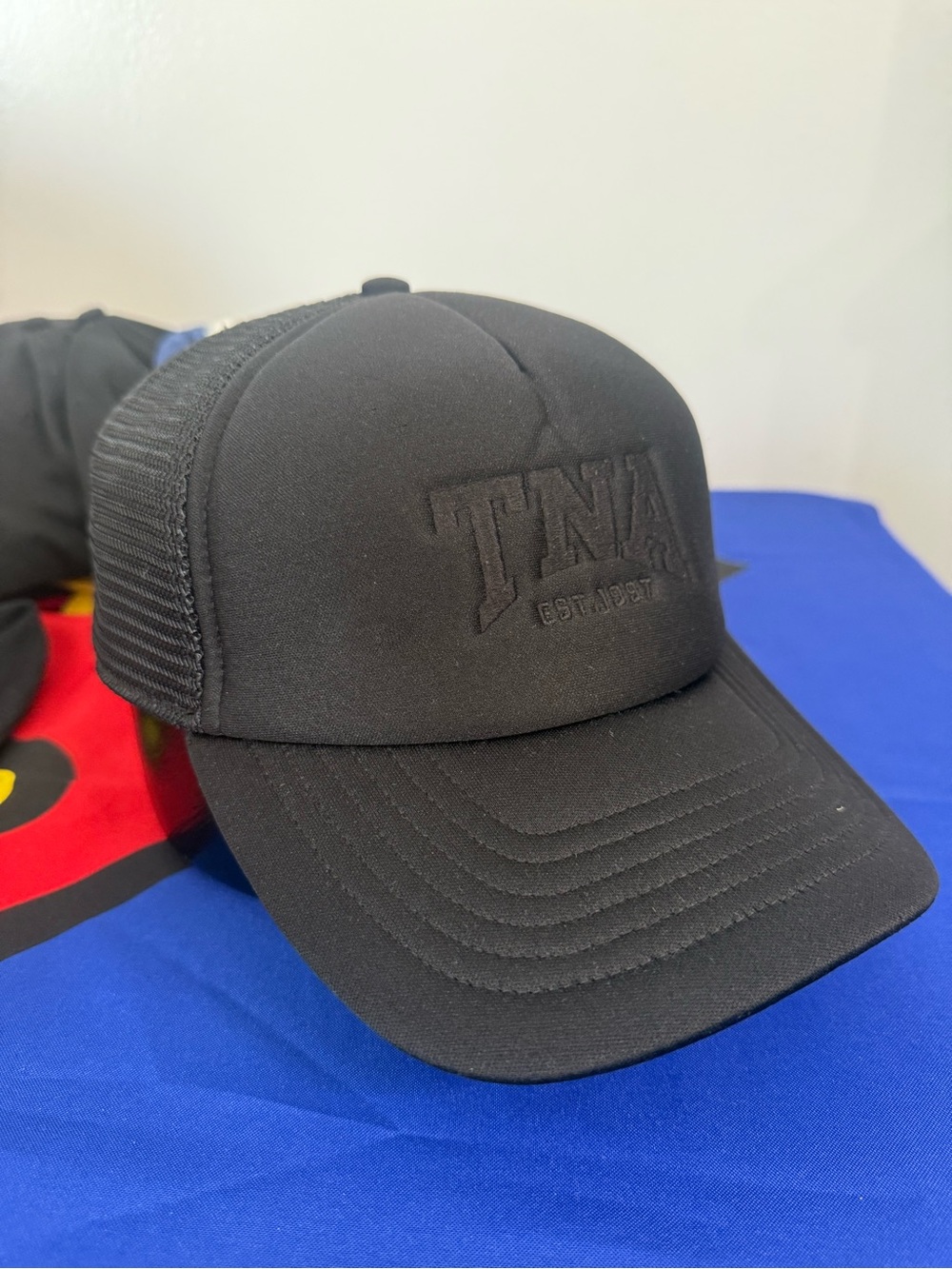 TNA Black Raised Logo Trucker Cap